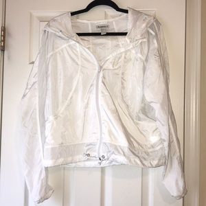 white windbreaker